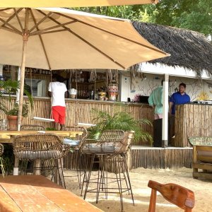 Beach bar built of bamboo with delicious food and relaxing hammocks