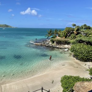 Beautiful beach cove with crystal clear water and tropical vegetation for filming on French Caribbean Island St. Martin