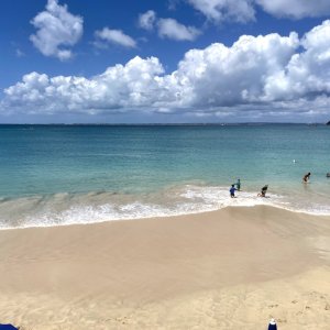 Crystal clear sea and flat white sandy Caribbean beach for bathing suit video 