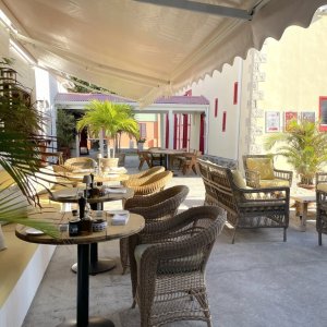 Open air restaurant next to the local theater in the village of French Saint Martin