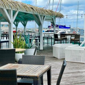 Harbour bar at busy pier in marigot