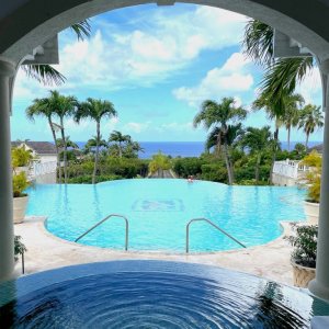 Infinity pool on hill overlooking the Caribbean sea