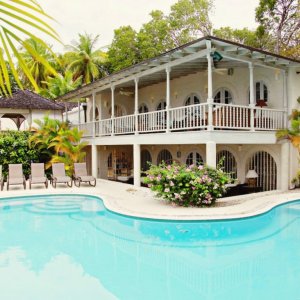 Swimming pool next to colonial style villa with production team accommodation and direct access to fabulous Barbados beach