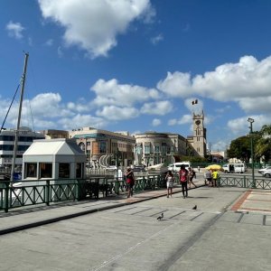 Bridge in Bridgetown crossing marina with view on to Barbados parliament