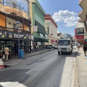 Busy city life in Bridgetown main shopping street