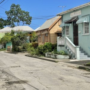 Chattel house in Barbados built with brickand painted in pastel colors