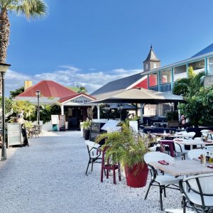 Elegant restaurants on village square in French town of baie orientale on the island of Saint Martin